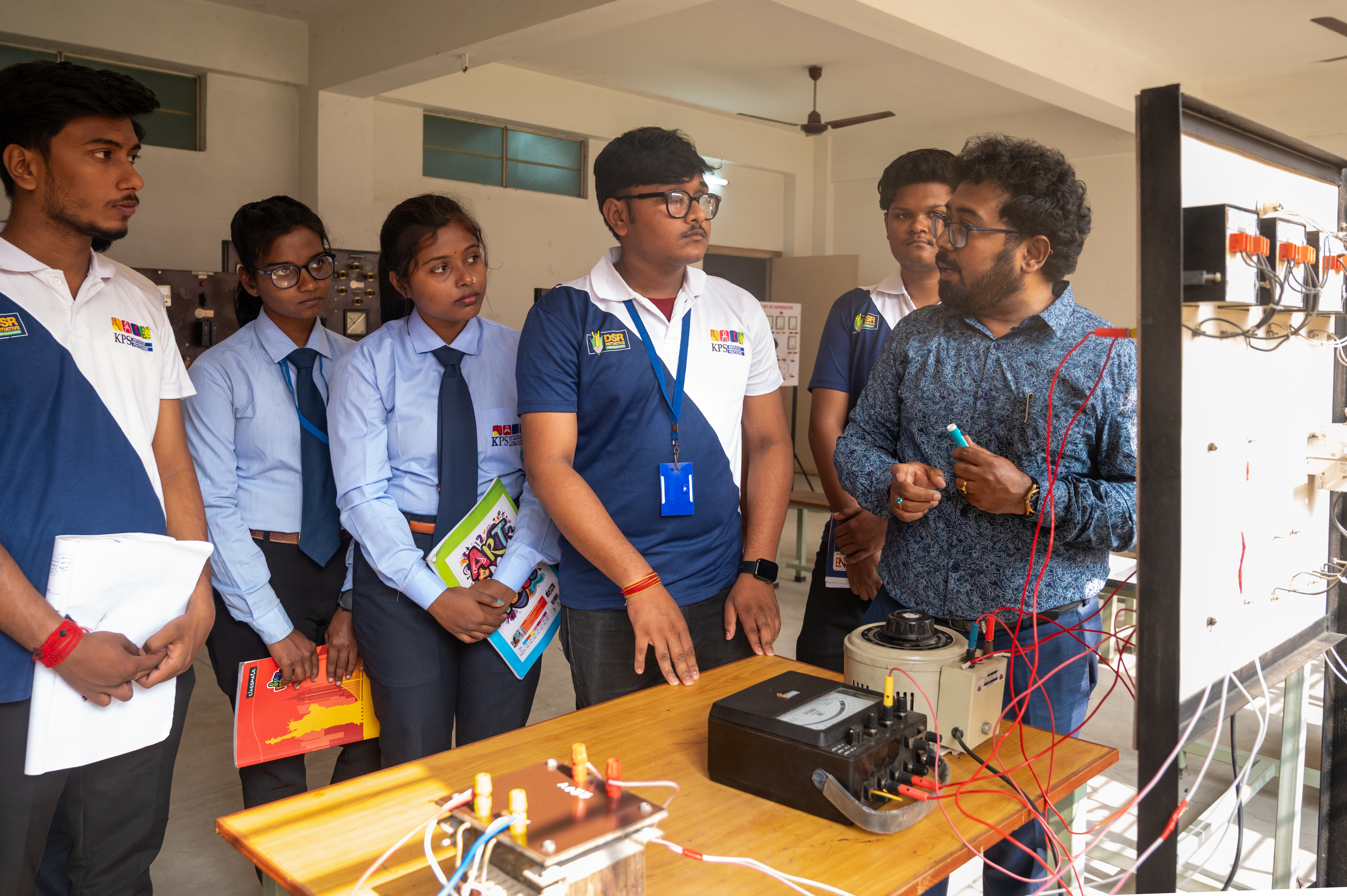 Students performing an electrical engineering practical